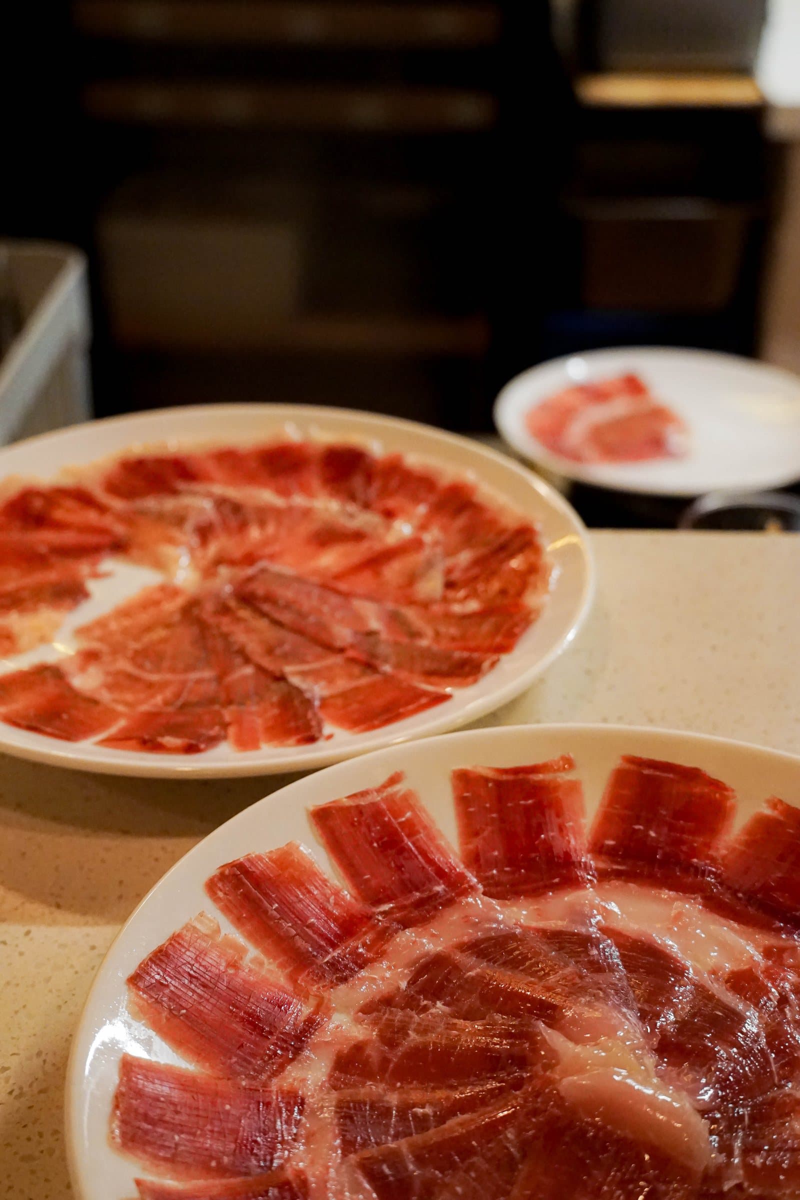 Jamón Ibérico de Bellota, hand-carved at IBÉRICO
